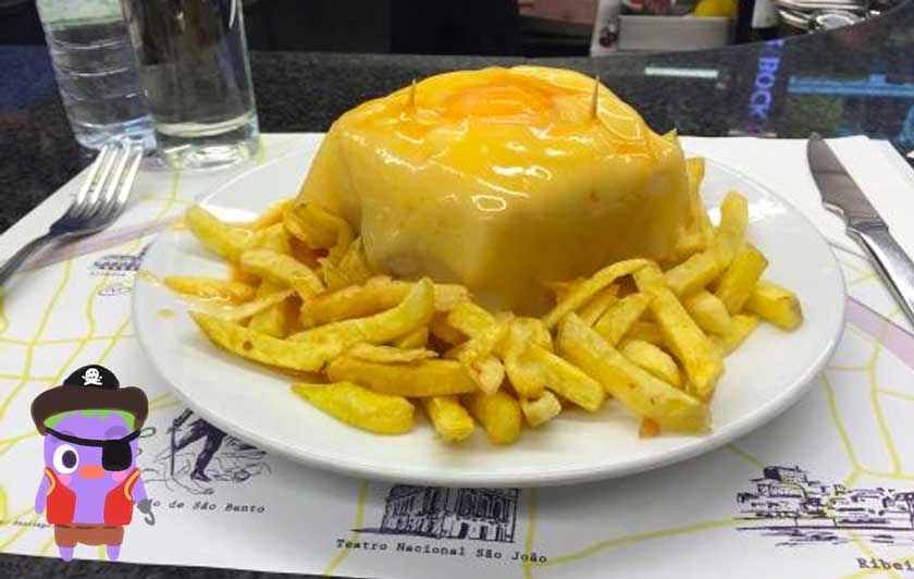 Sandwich relleno con huevo y queso en Oporto
